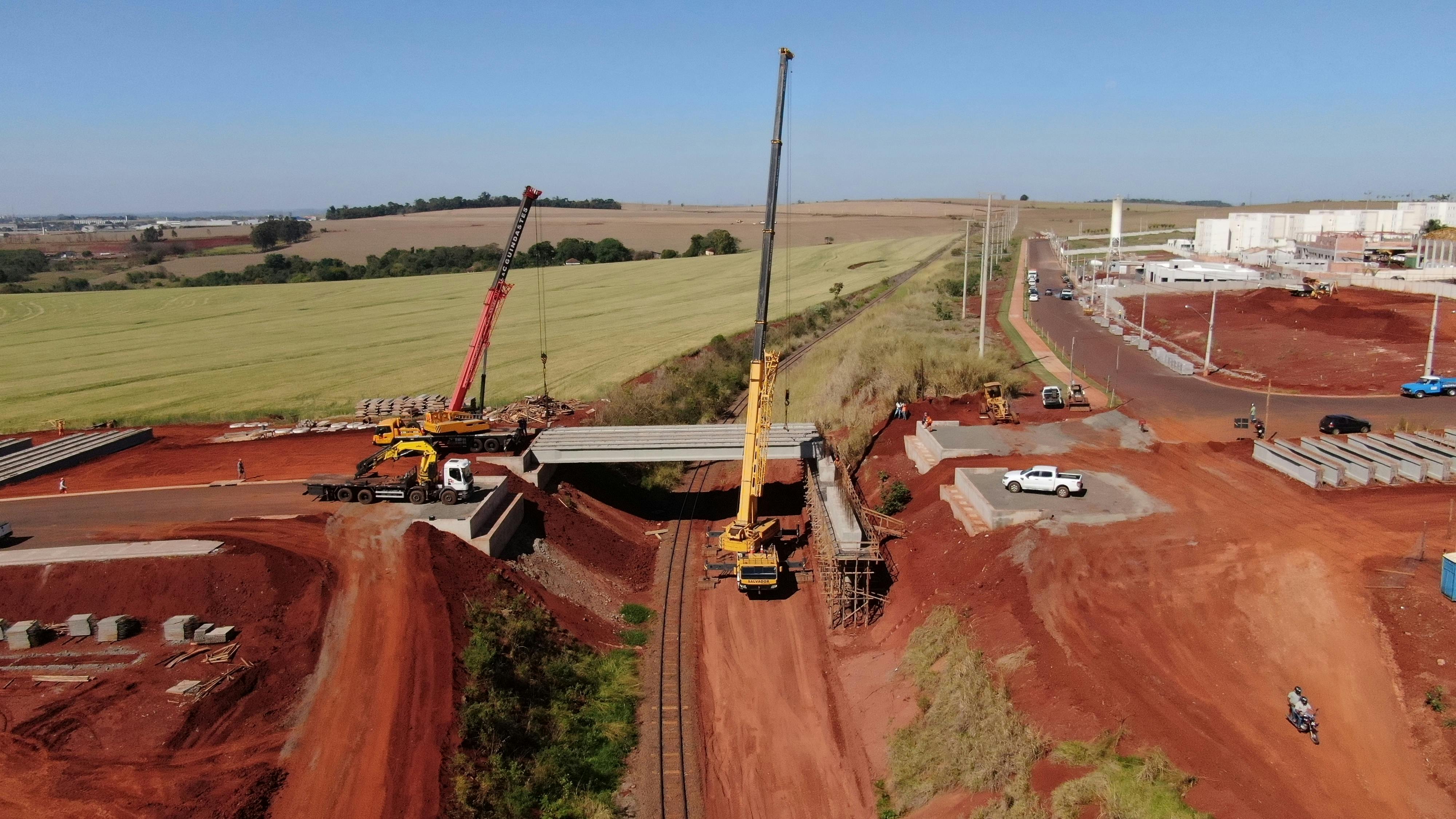Infrastructure and construction — large construction site, crane, commercial building project